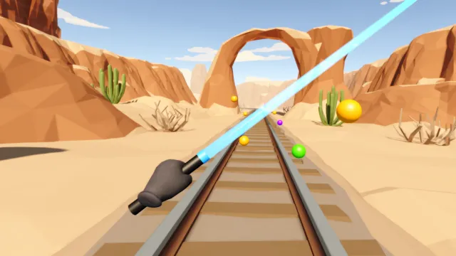 Colorball gameplay: a laser sword above desert railway tracks, colored balls flying in.